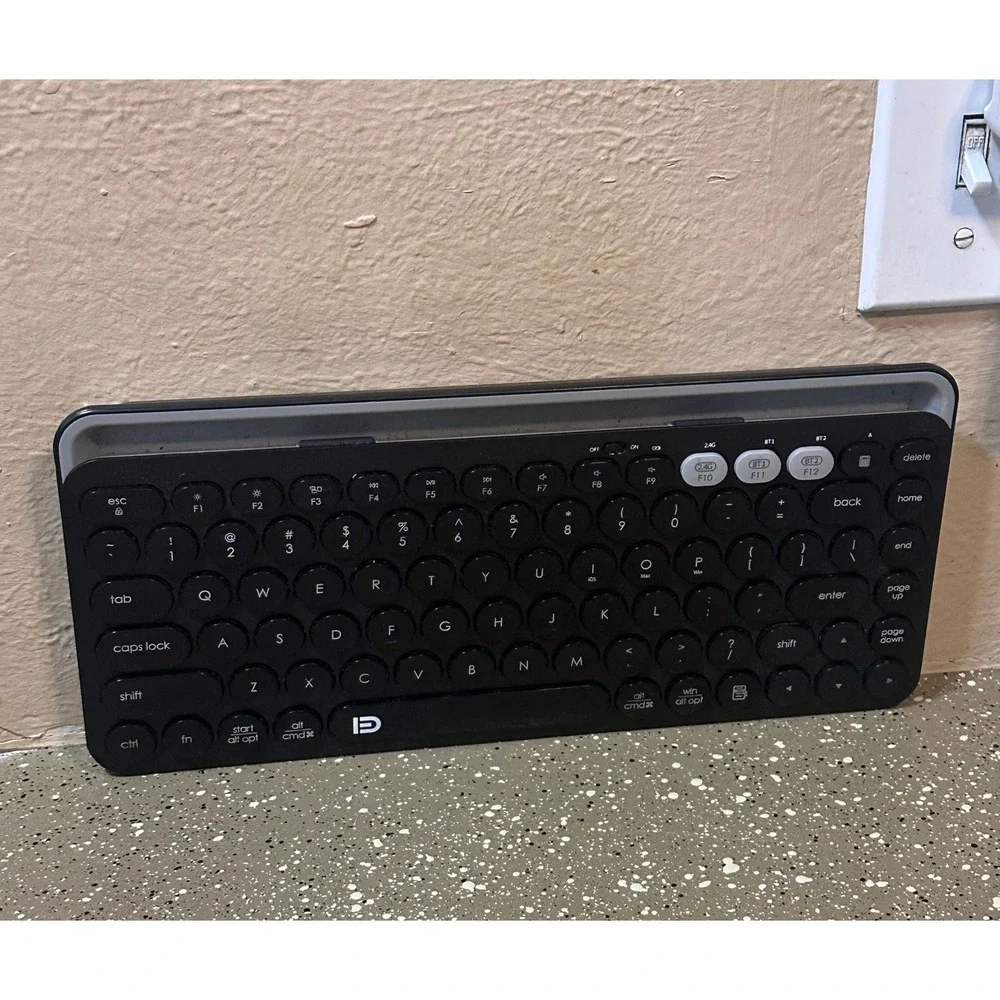 Multi-Device Bluetooth Wireless Keyboard with Integrated Tablet Stand - Picture 2 of 8
